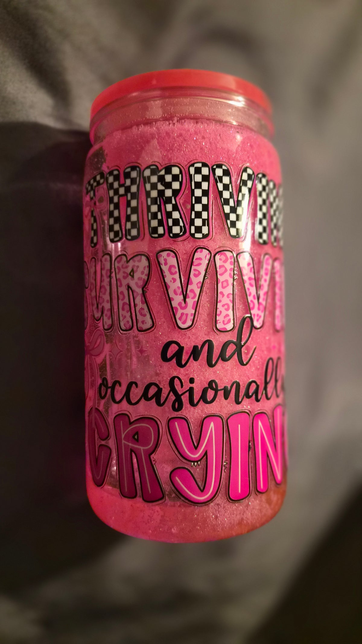 Surviving, Thriving & Occasionally Crying Pink Glitter Tumbler
